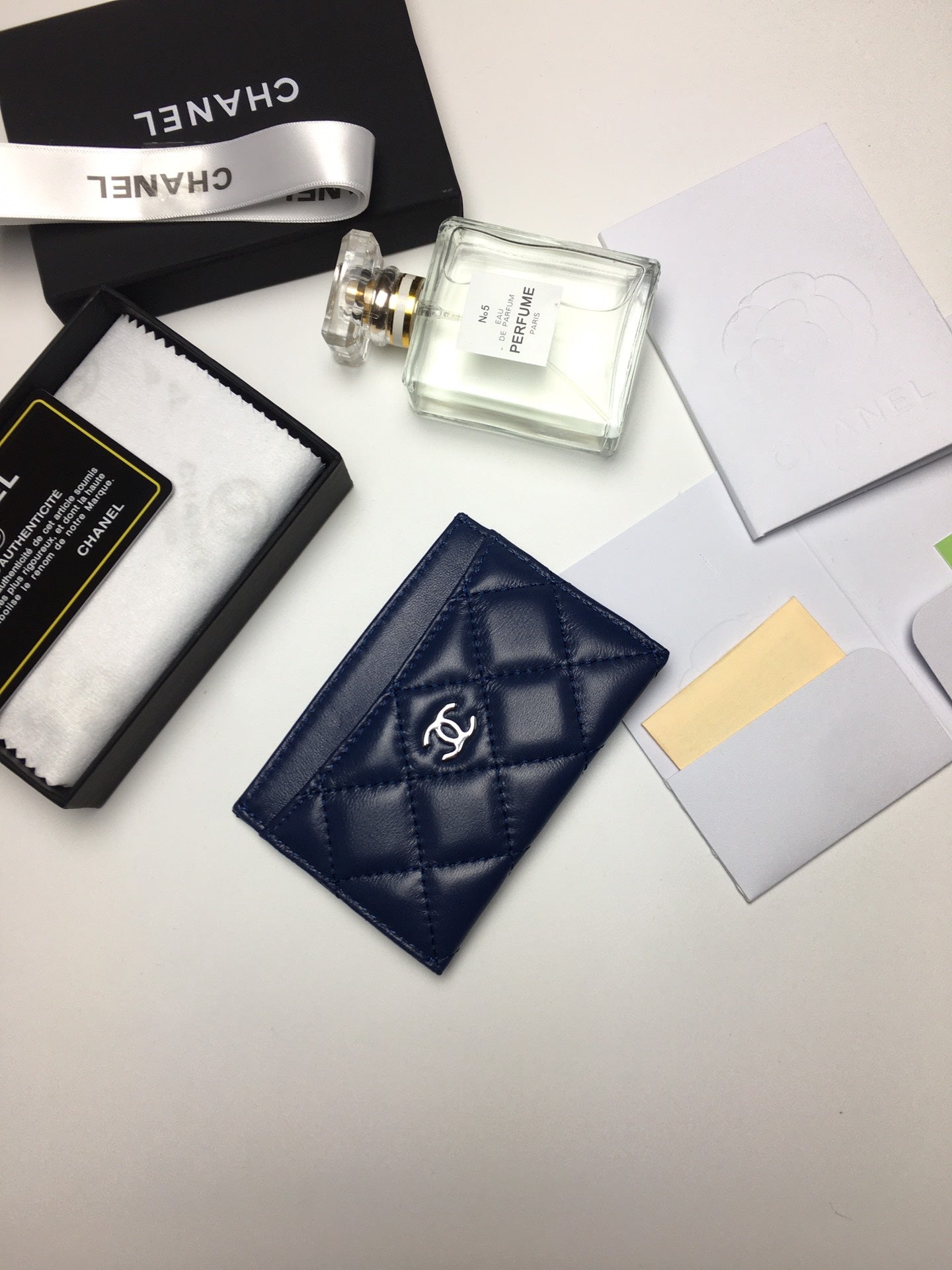 CC CARD HOLDER 11.2 NAVY CALFSKIN SILVER ICON