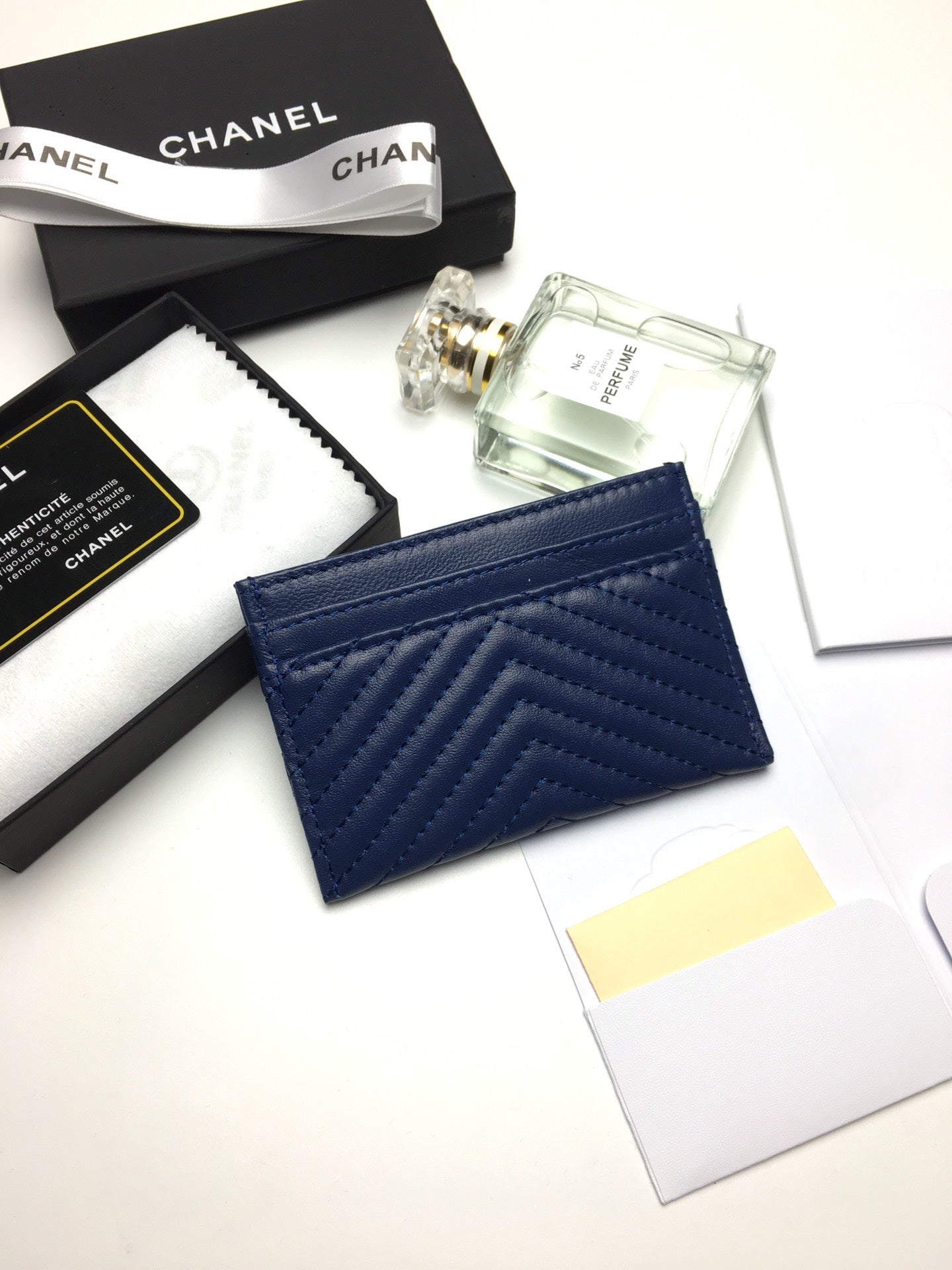 CC LINE CARD HOLDER 11.2 NAVY CALFSKIN GOLD ICON
