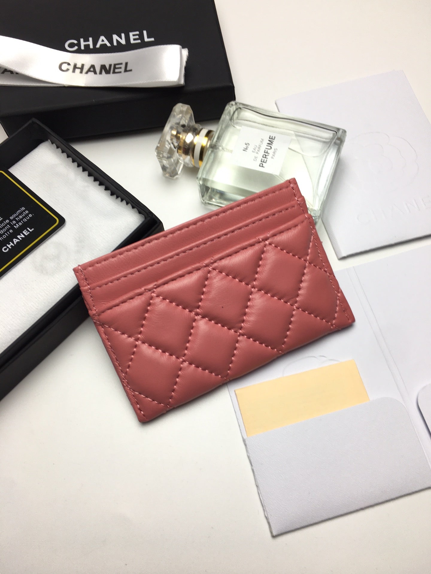 CC BOY CARD HOLDER 11.2 CORAL CALFSKIN GOLD ICON