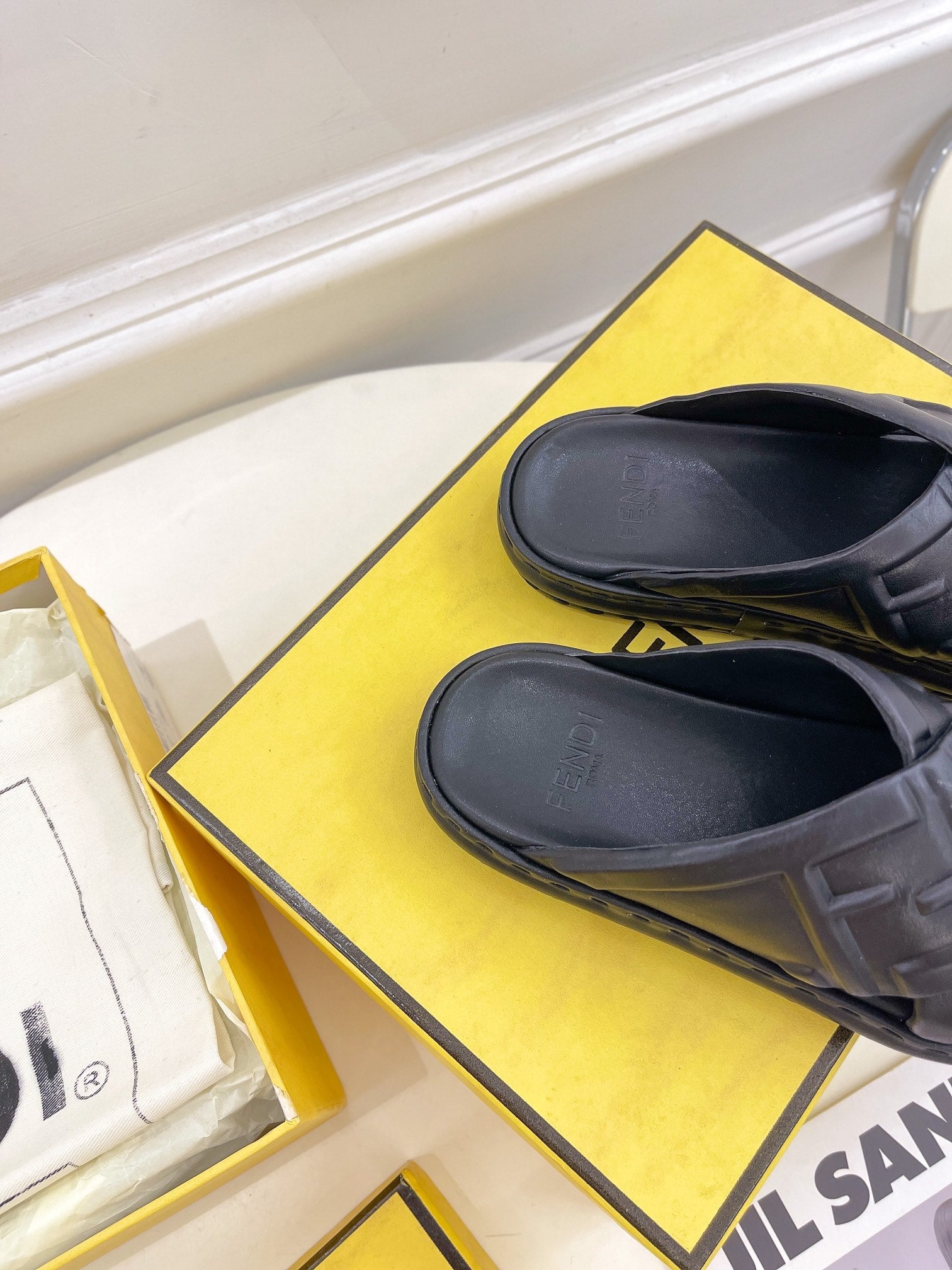 FENDI CROSSOVER SLIPPER IN BLACK CALFSKIN