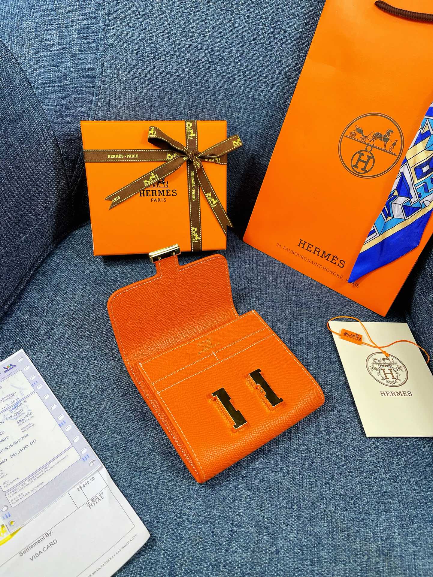 HM CONSTANCE 12 ORANGE CALFSKIN GOLD HARDWARE