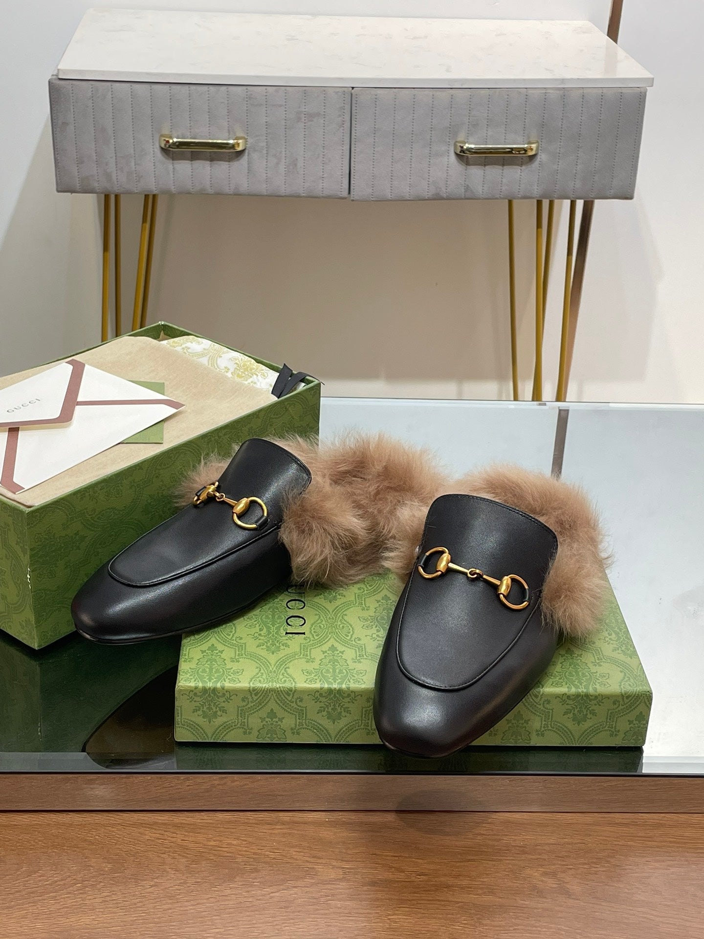 HORSEBIT MULE IN BLACK CALFSKIN AND LAMB WOOL LINING