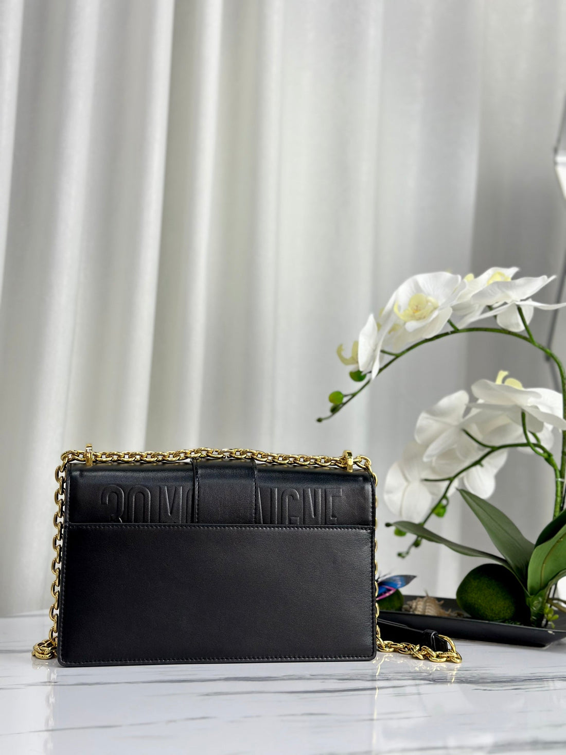 MONTAIGNE 25 BAG IN BLACK CALFSKIN