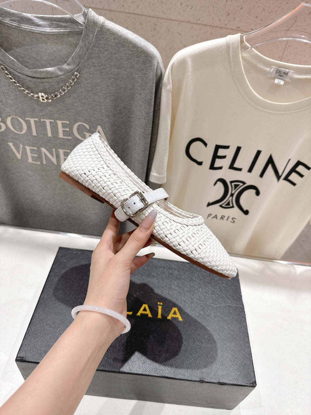 ALAIA MARY JANE FLATS white woven calfskin pattent