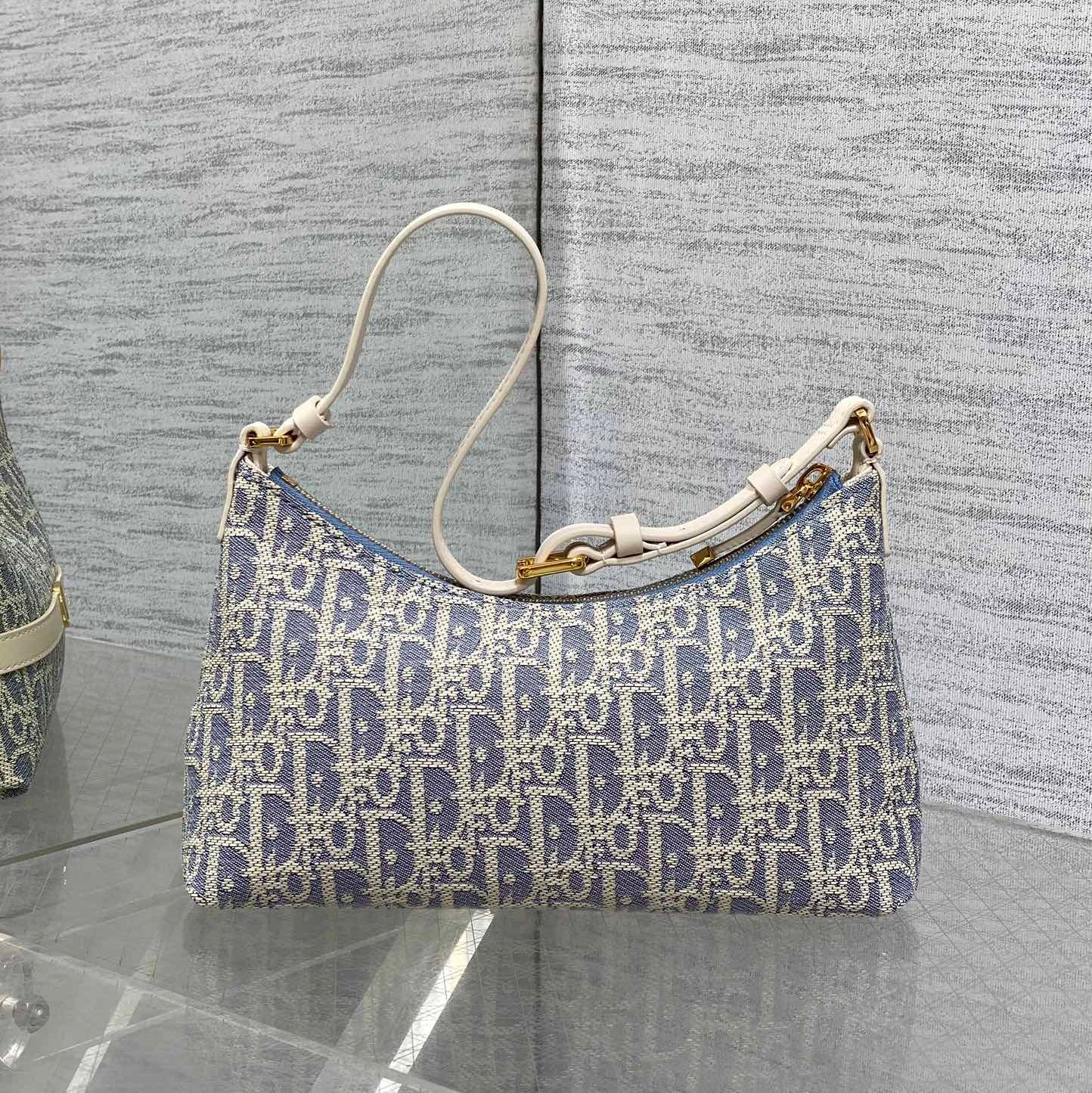 CD  Miss Caro 24 blue raffia-effect fabric
