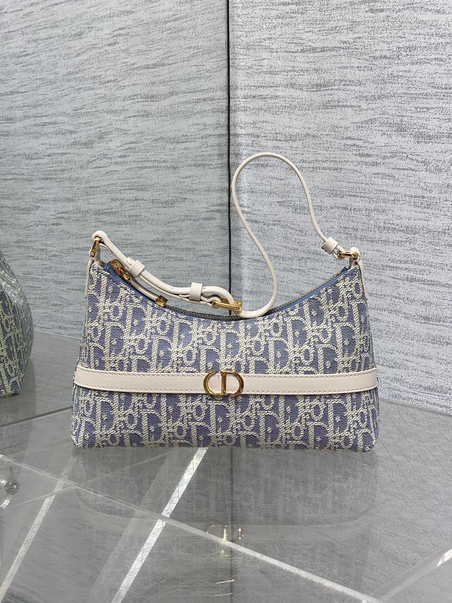 CD  Miss Caro 24 blue raffia-effect fabric