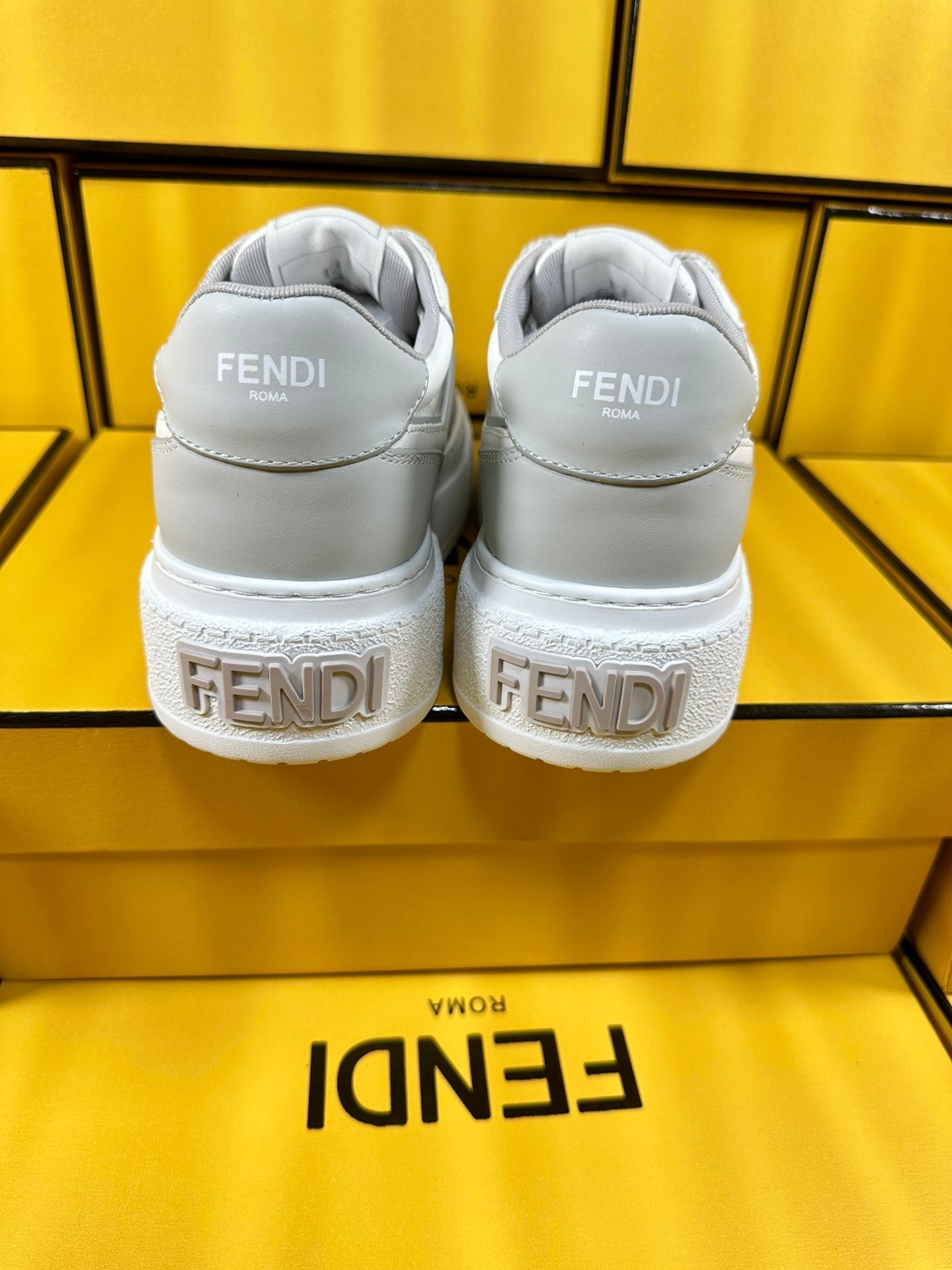 FENDI THICK-SOLDED SNEAKER IN WHITE MIX GREY LAMBSKIN
