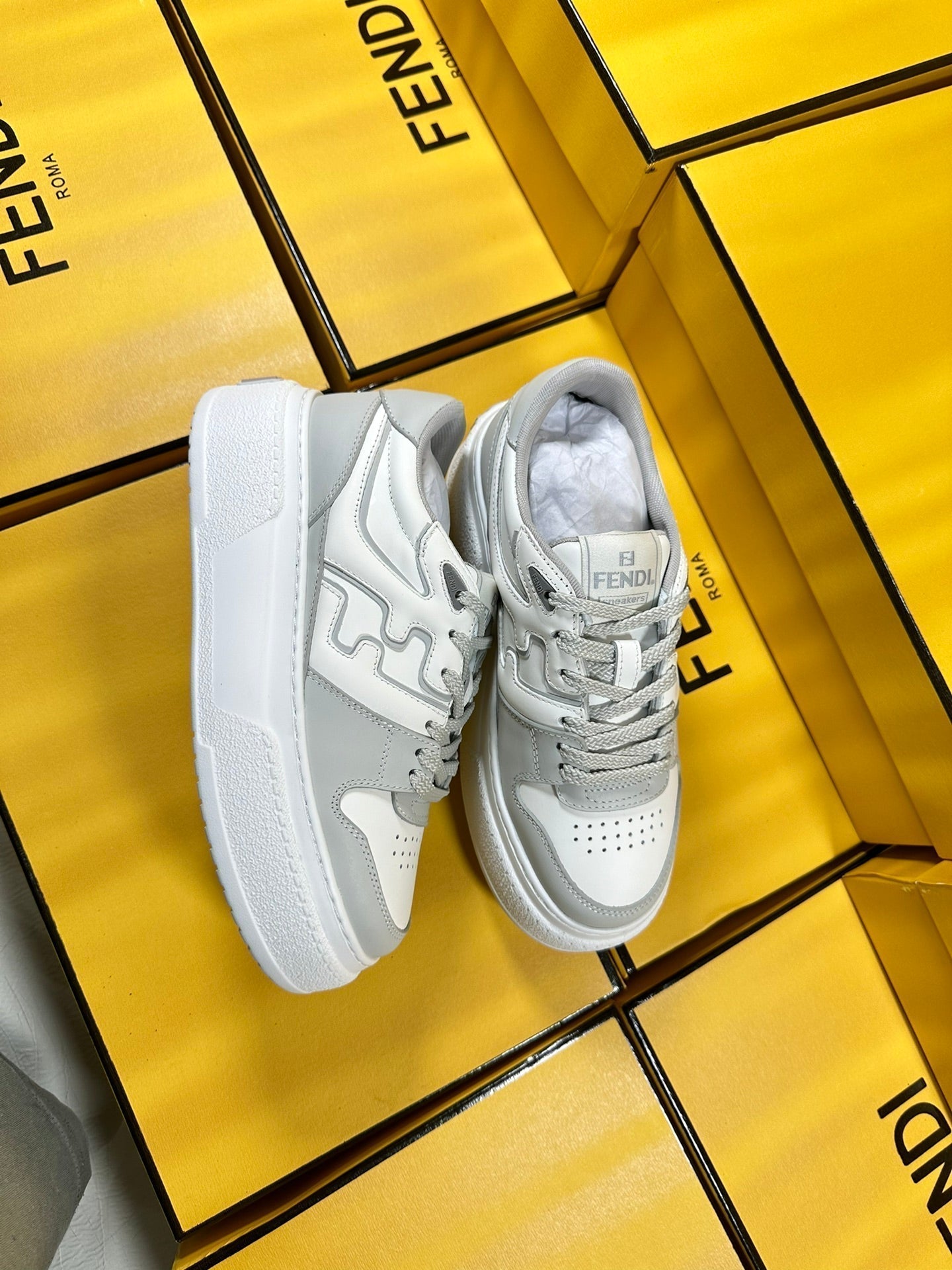 FENDI THICK-SOLDED SNEAKER IN WHITE MIX GREY LAMBSKIN