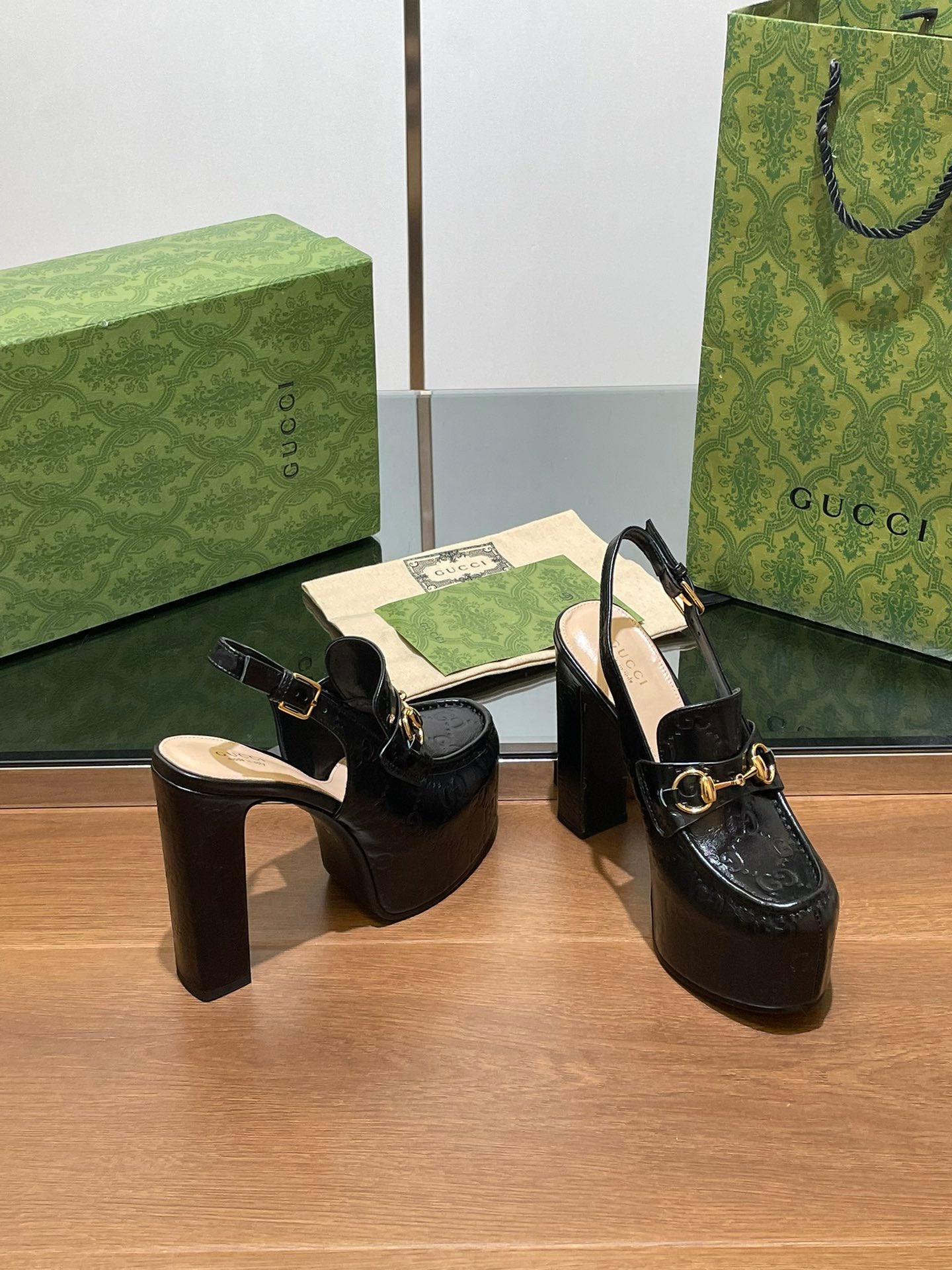 GG WOMEN'S HORSEBIT PLATFORM SLINGBACK IN BLACK EMBOSSED CALFSKIN