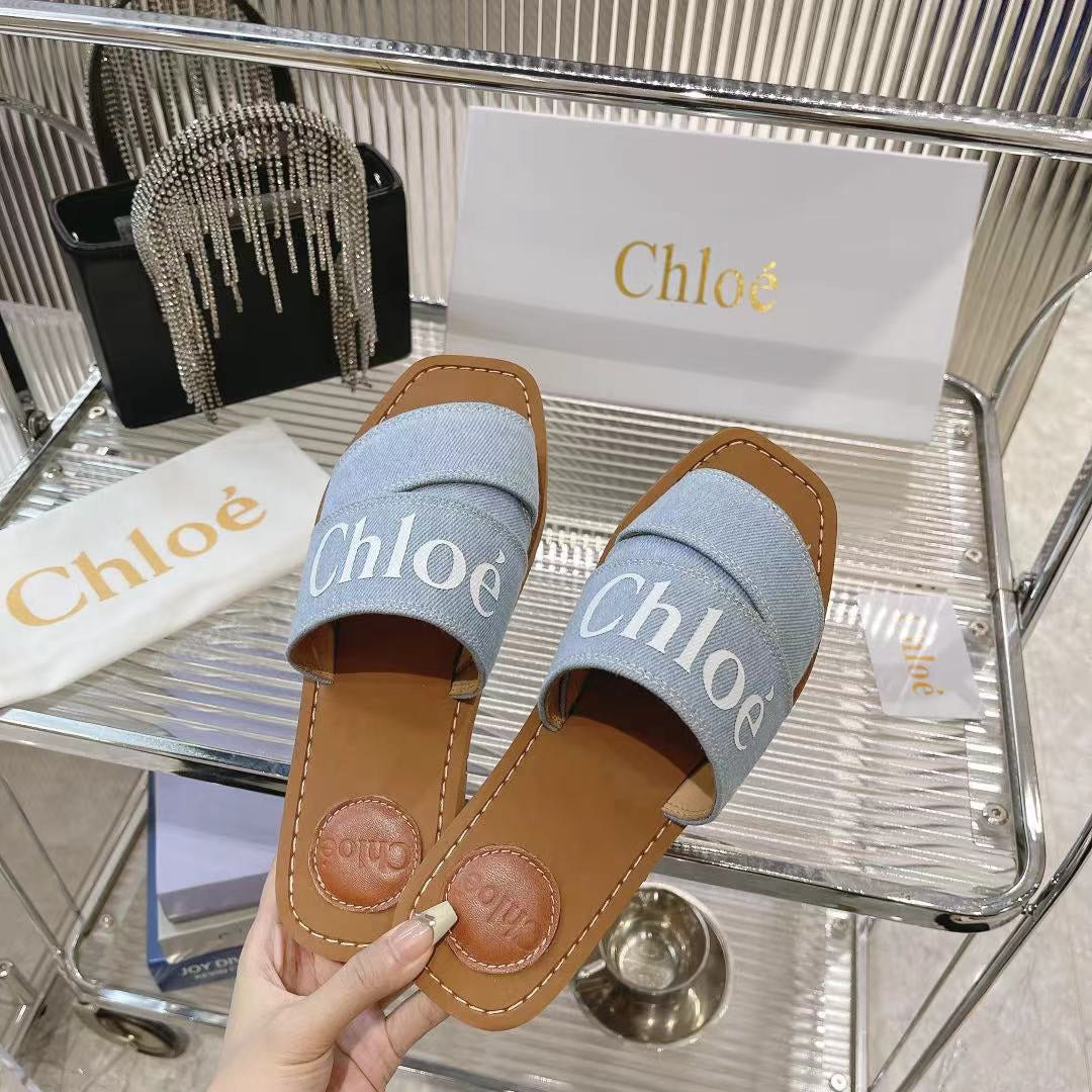 CHLOE WOODY MULE IN LIGHT BLUE DENIM WITH WHITE LOGO