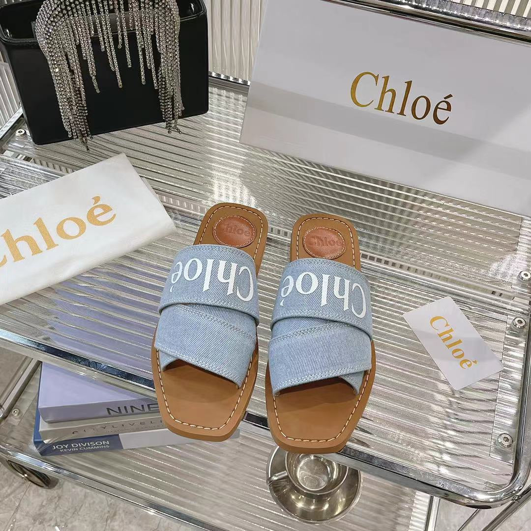 CHLOE WOODY MULE IN LIGHT BLUE DENIM WITH WHITE LOGO