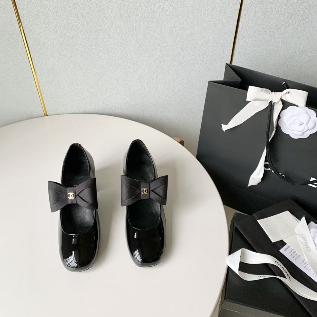 mary janes 60 black patent calfskin bow