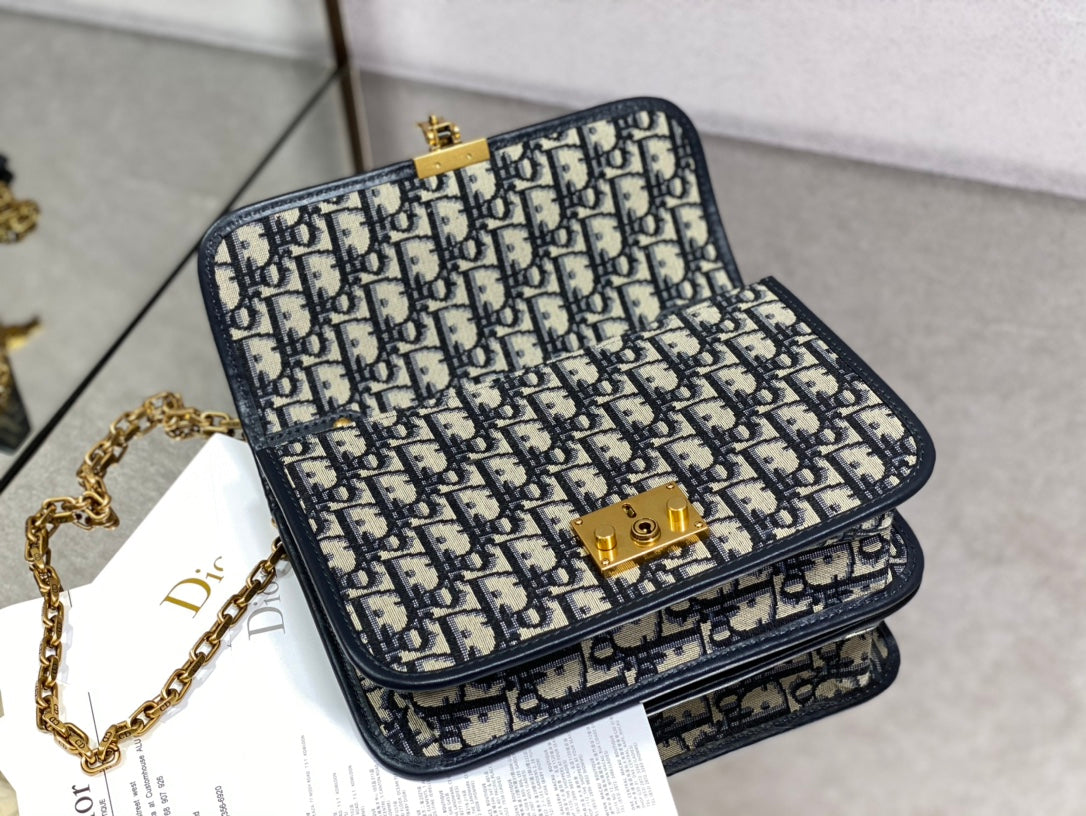 CD embroidered chain bag 24 dark blue leather cotton