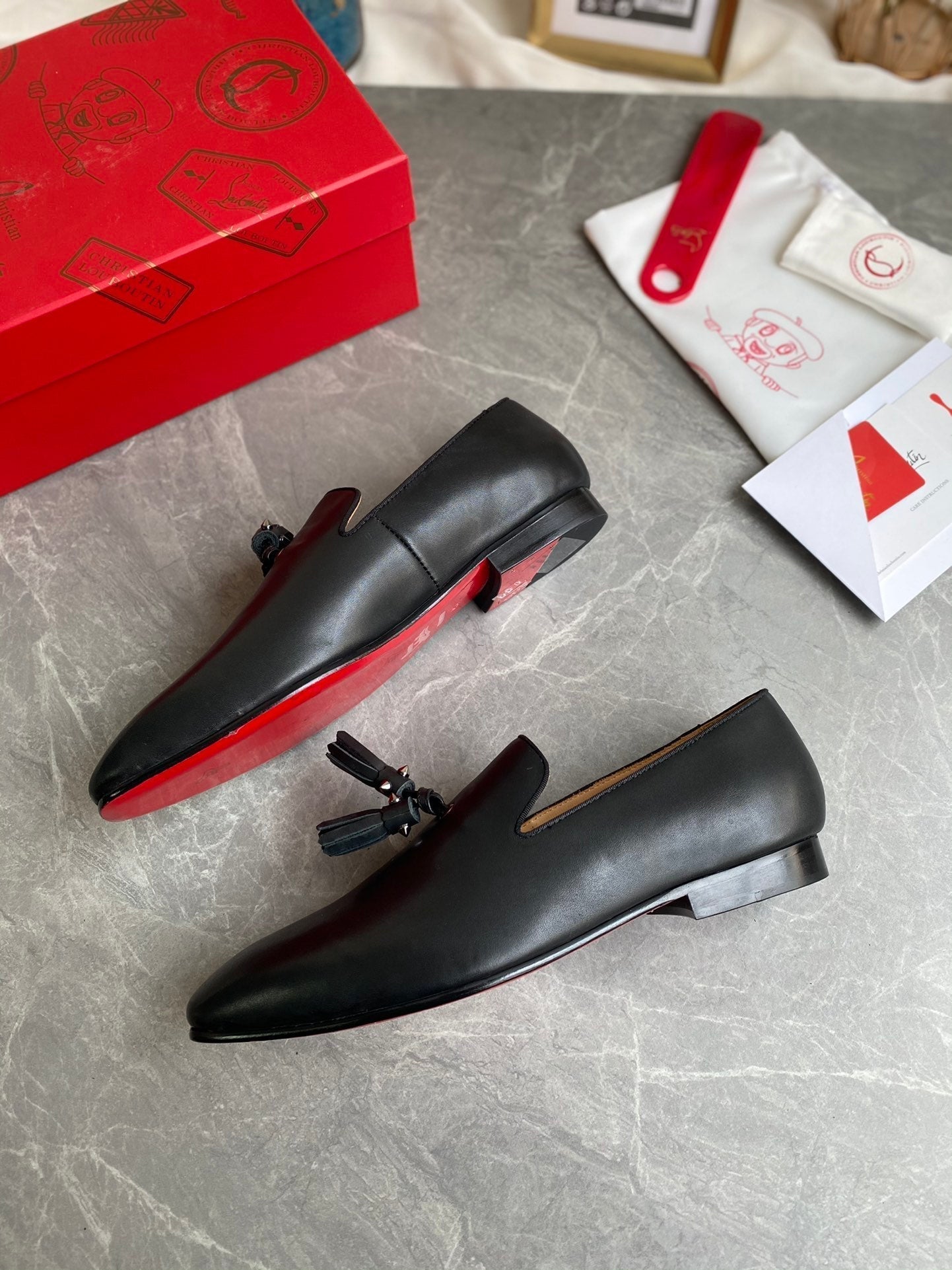 CL Dandelion Tassel Loafers Black Cowhide 242404