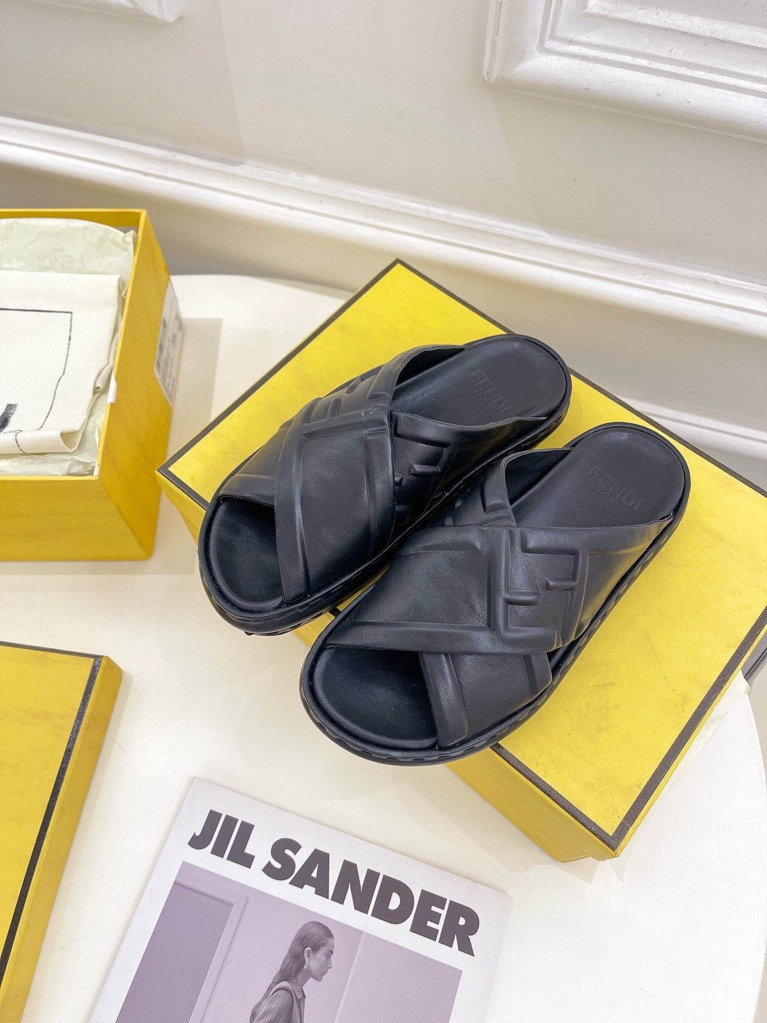 FENDI CROSSOVER SLIPPER IN BLACK CALFSKIN