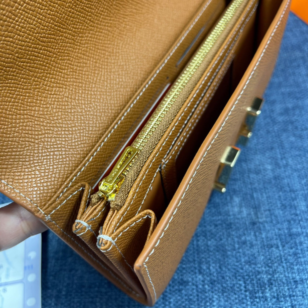 HM CLUTCH CONSTANCE 22 BRONZE CALFSKIN GOLD HARDWARE