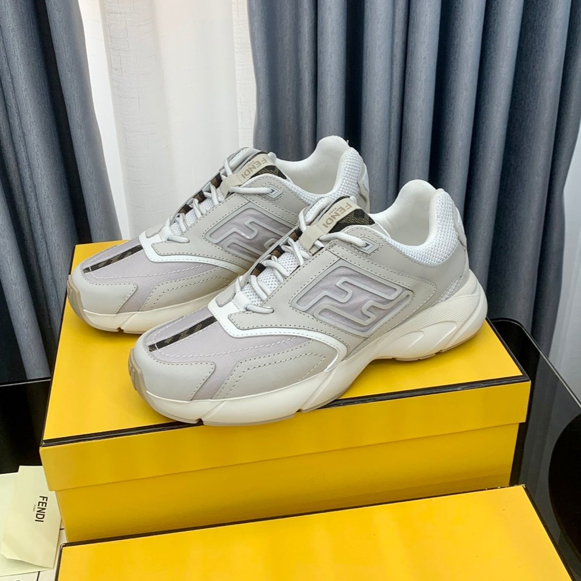 FENDI FASTER TRAINER IN GREY CALFSKIN AND SUEDE