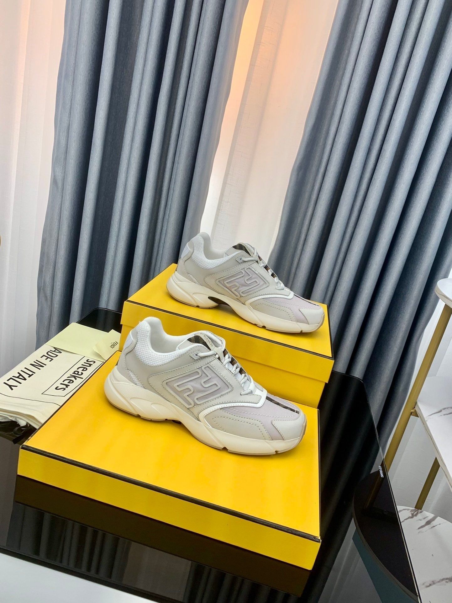 FENDI FASTER TRAINER IN GREY CALFSKIN AND SUEDE