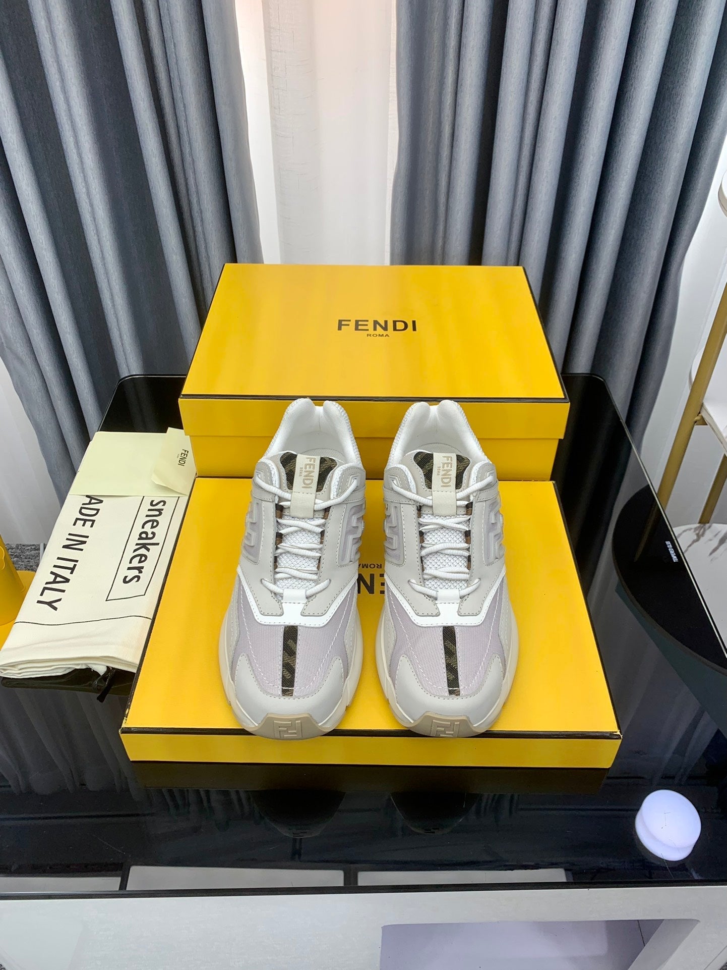 FENDI FASTER TRAINER IN GREY CALFSKIN AND SUEDE