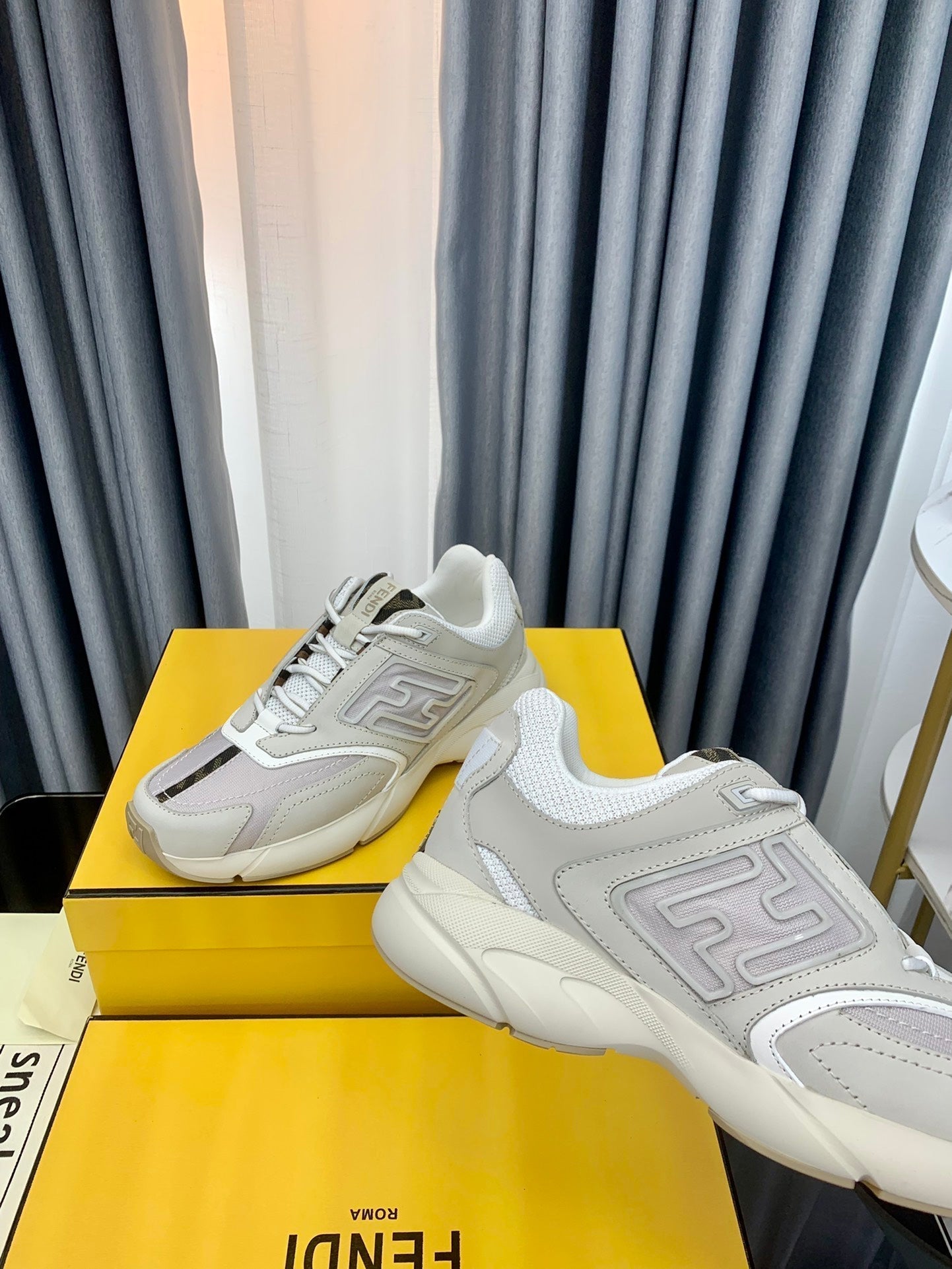 FENDI FASTER TRAINER IN GREY CALFSKIN AND SUEDE