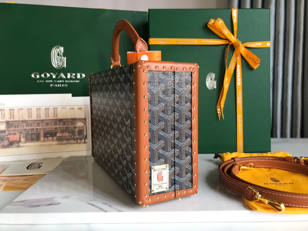 GRAND HÃ”TEL TRUNK BAG 24 IN BLACK GOYARDINE CANVAS AND TAN CALFSKIN