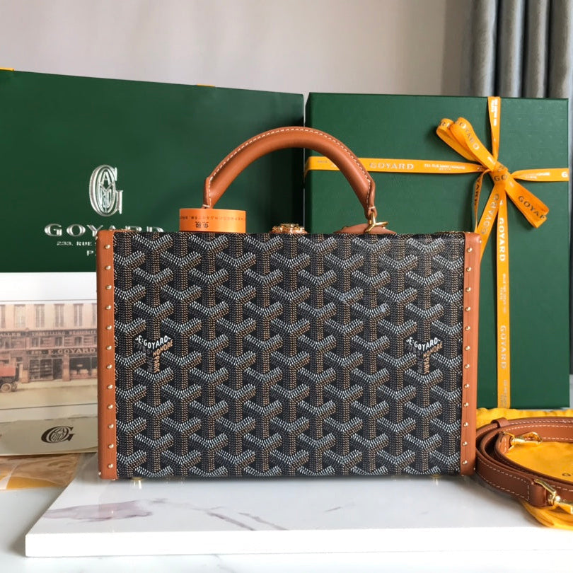GRAND HÃ”TEL TRUNK BAG 24 IN BLACK GOYARDINE CANVAS AND TAN CALFSKIN
