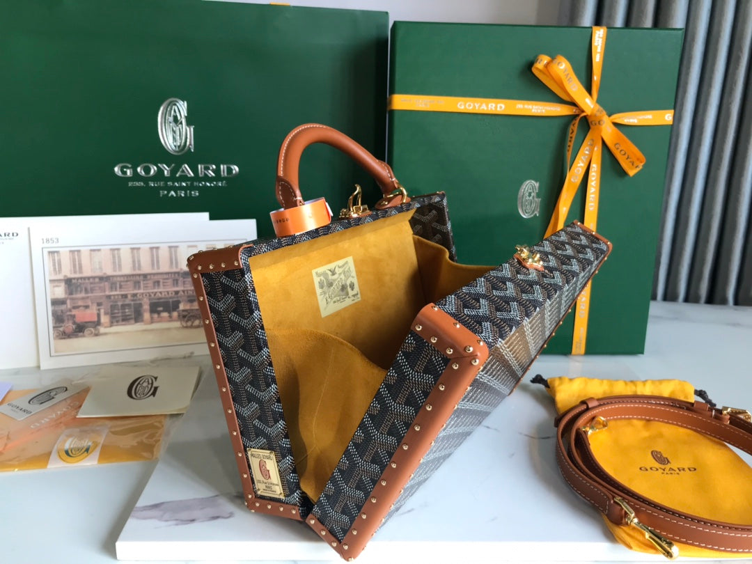 GRAND HÃ”TEL TRUNK BAG 24 IN BLACK GOYARDINE CANVAS AND TAN CALFSKIN