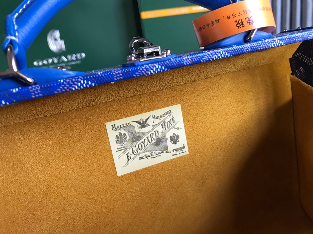 GRAND HÃ”TEL TRUNK BAG 24 IN BLUE GOYARDINE CANVAS AND CALFSKIN