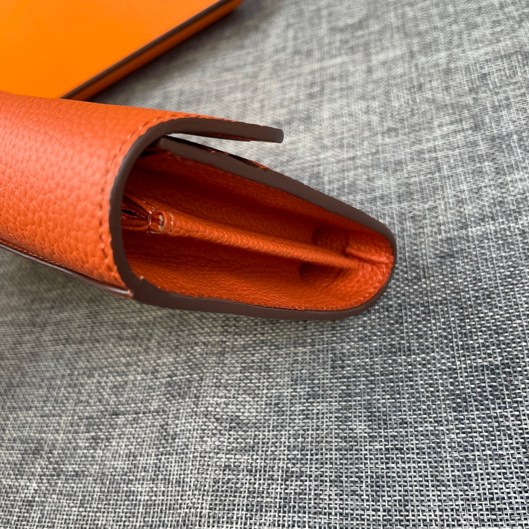 HM CLUTCH CONSTANCE 22 ORANGE CALFSKIN GOLD HARDWARE