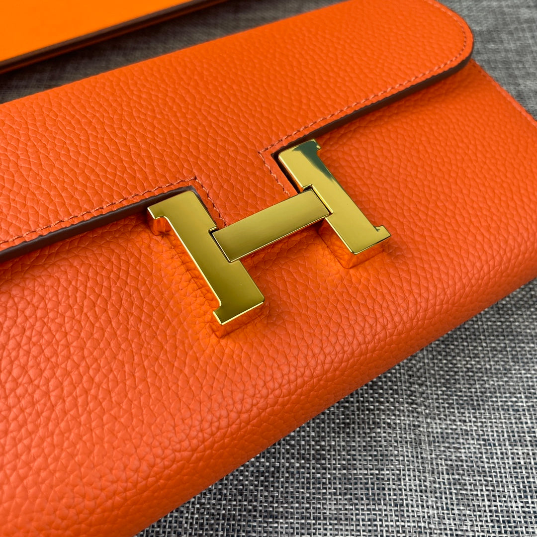 HM CLUTCH CONSTANCE 22 ORANGE CALFSKIN GOLD HARDWARE