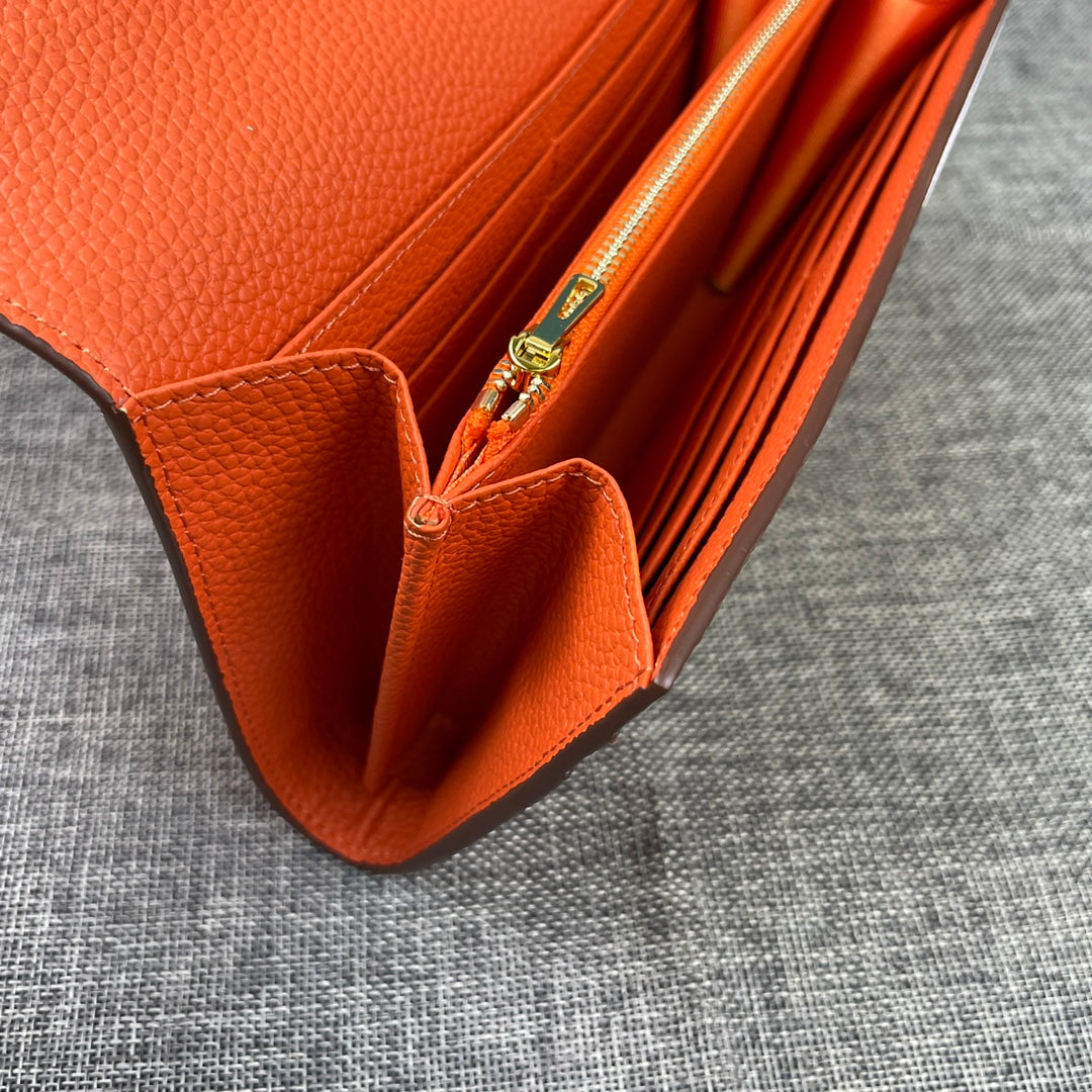 HM CLUTCH CONSTANCE 22 ORANGE CALFSKIN GOLD HARDWARE