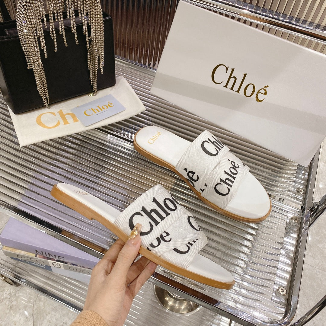 CHLOE WOODY SLIPPER IN WHITE MIX BLACK CANVAS