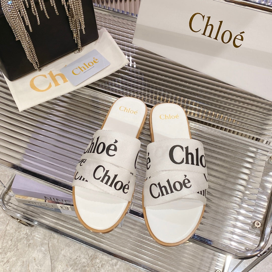 CHLOE WOODY SLIPPER IN WHITE MIX BLACK CANVAS