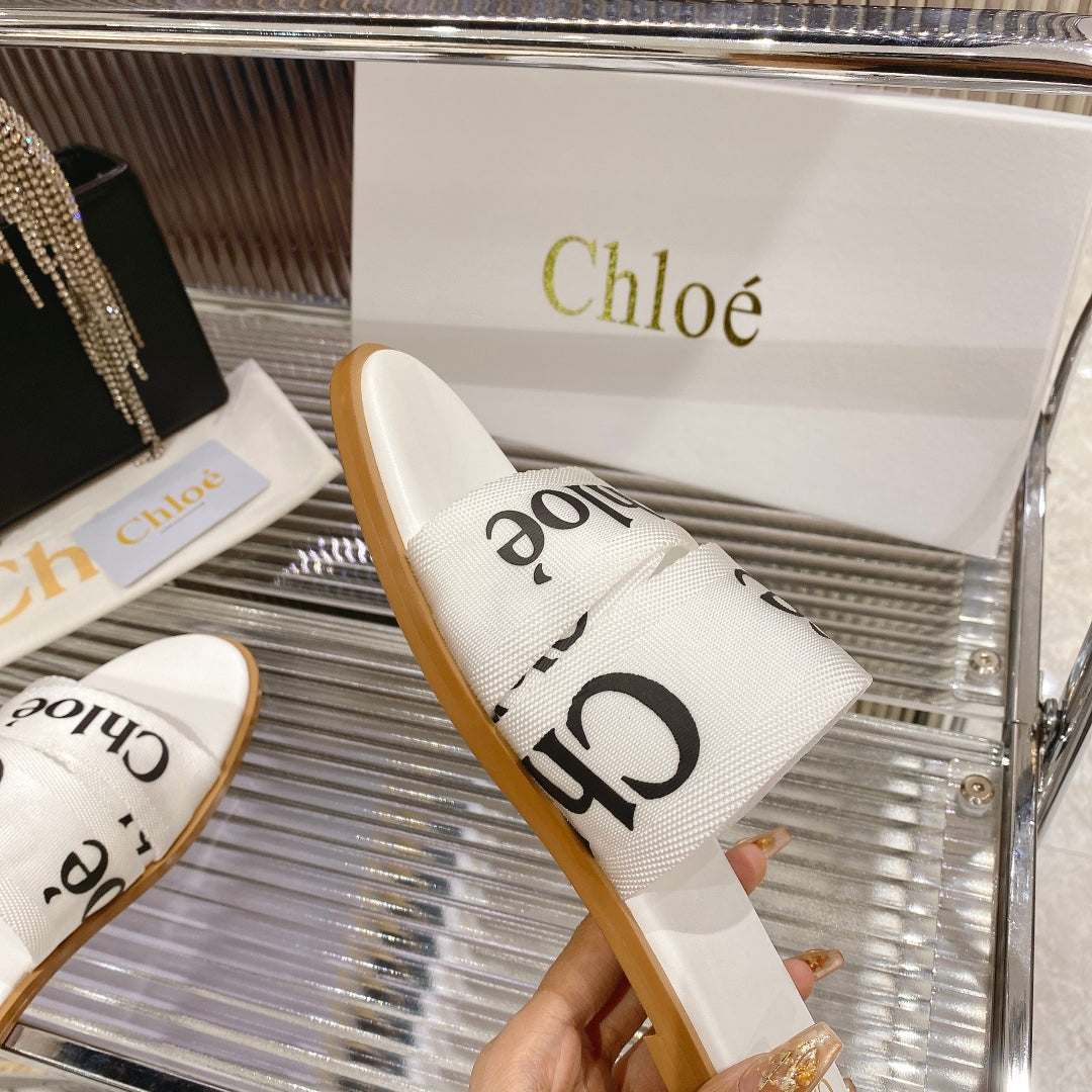 CHLOE WOODY SLIPPER IN WHITE MIX BLACK CANVAS