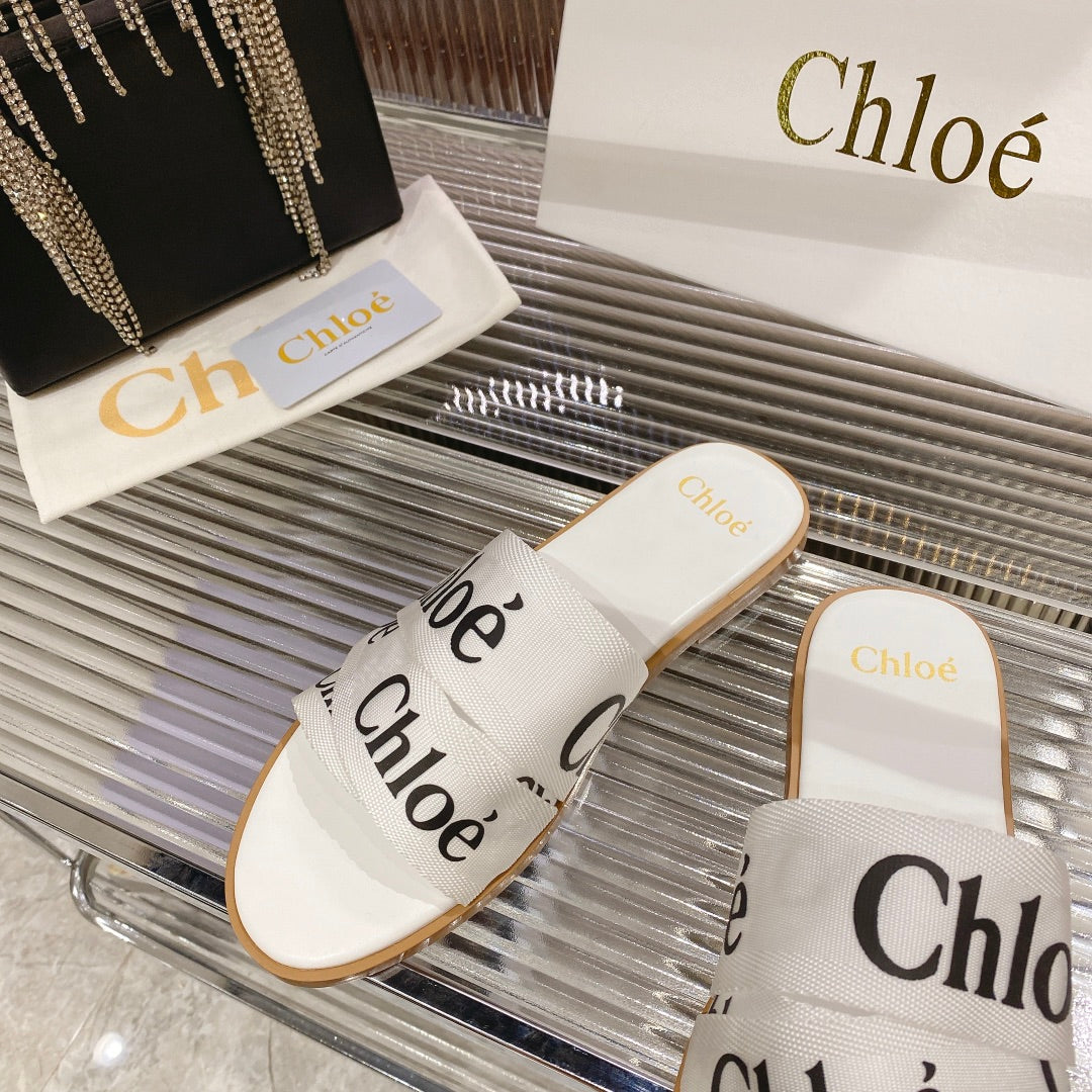 CHLOE WOODY SLIPPER IN WHITE MIX BLACK CANVAS