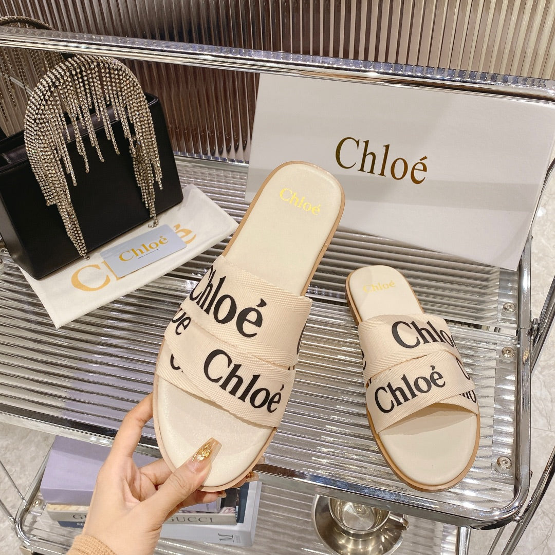 CHLOÃ‰ WOODY SLIPPER IN BEIGE MIX BLACK CANVAS