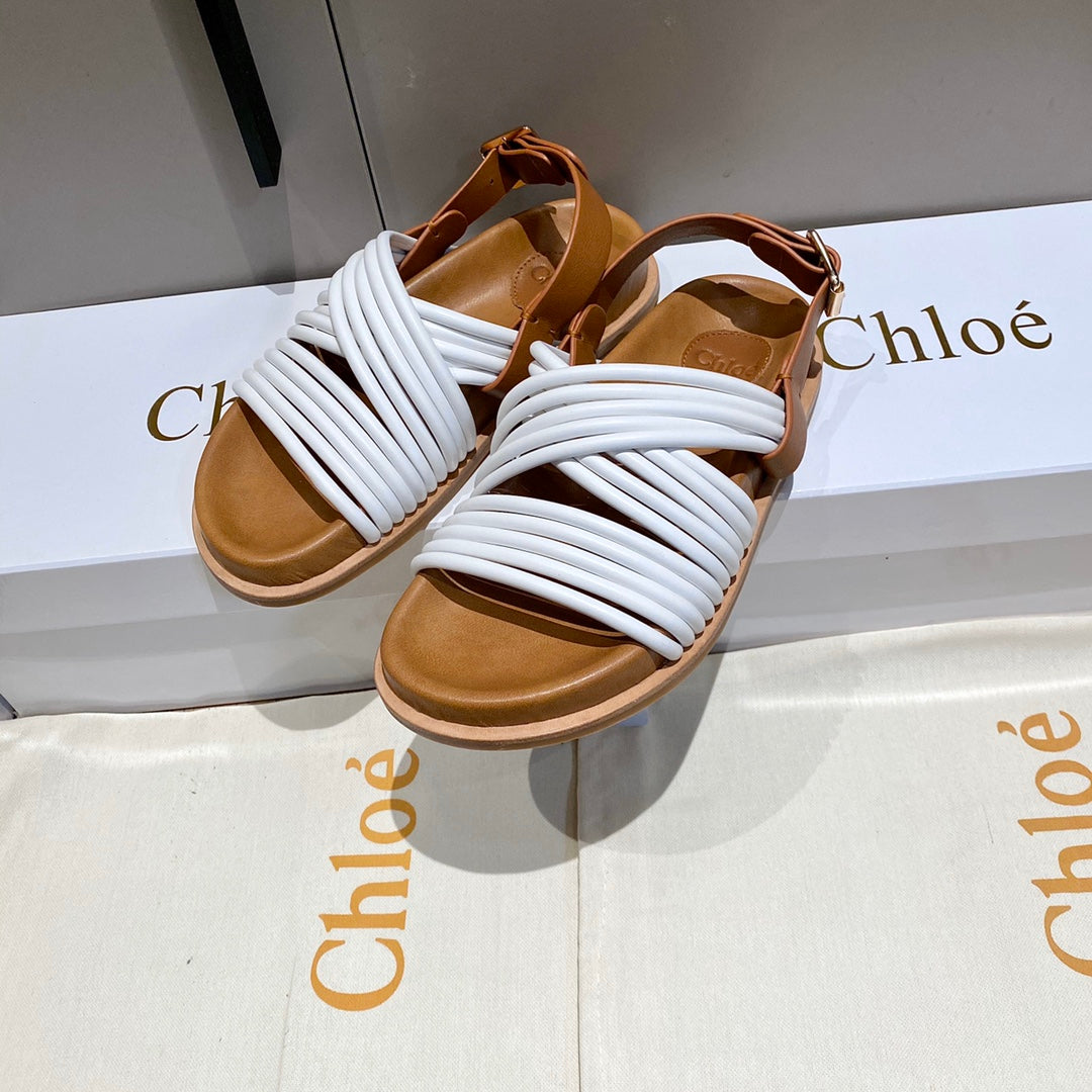 CHLOE CROSS STRAP SANDAL IN WHITE MIX BRONZE BROWN RUBBER WITH GOLD HARDWARE