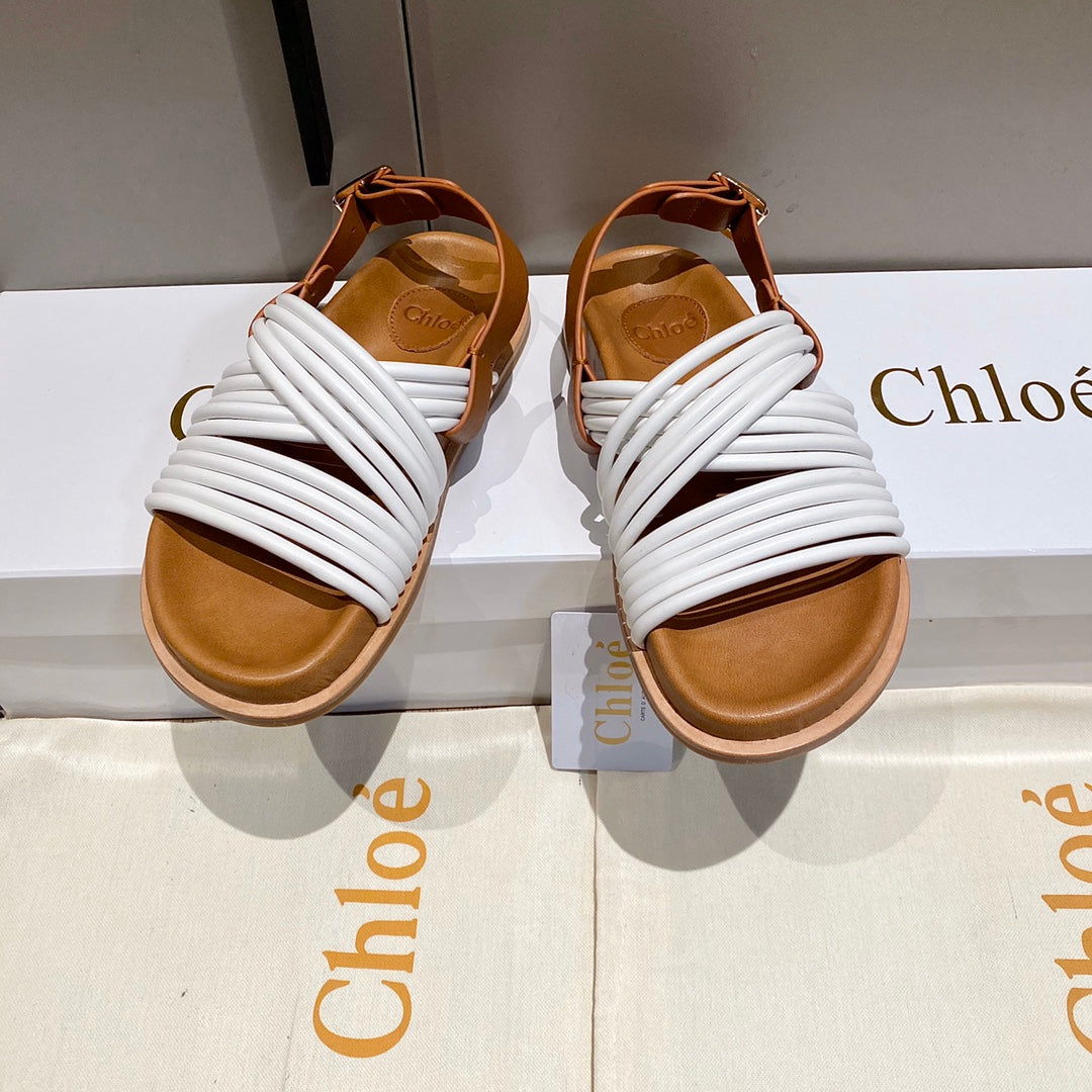 CHLOE CROSS STRAP SANDAL IN WHITE MIX BRONZE BROWN RUBBER WITH GOLD HARDWARE