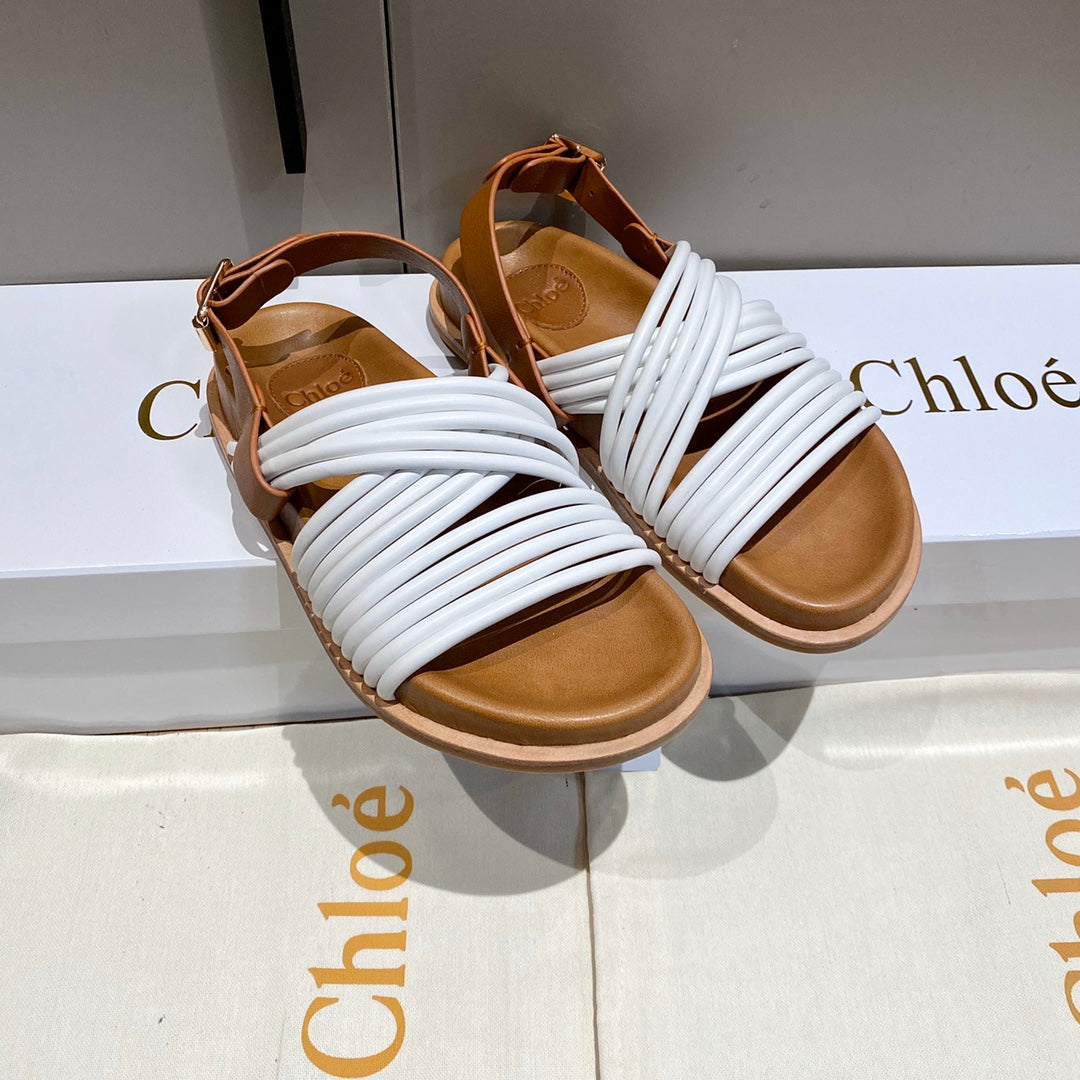 CHLOE CROSS STRAP SANDAL IN WHITE MIX BRONZE BROWN RUBBER WITH GOLD HARDWARE