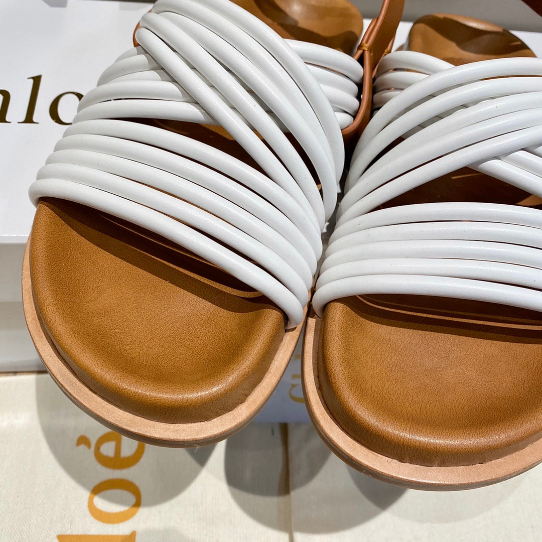CHLOE CROSS STRAP SANDAL IN WHITE MIX BRONZE BROWN RUBBER WITH GOLD HARDWARE