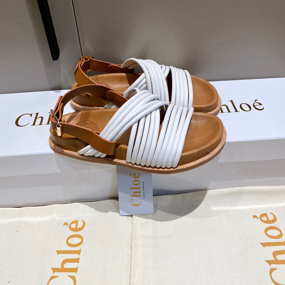 CHLOE CROSS STRAP SANDAL IN WHITE MIX BRONZE BROWN RUBBER WITH GOLD HARDWARE