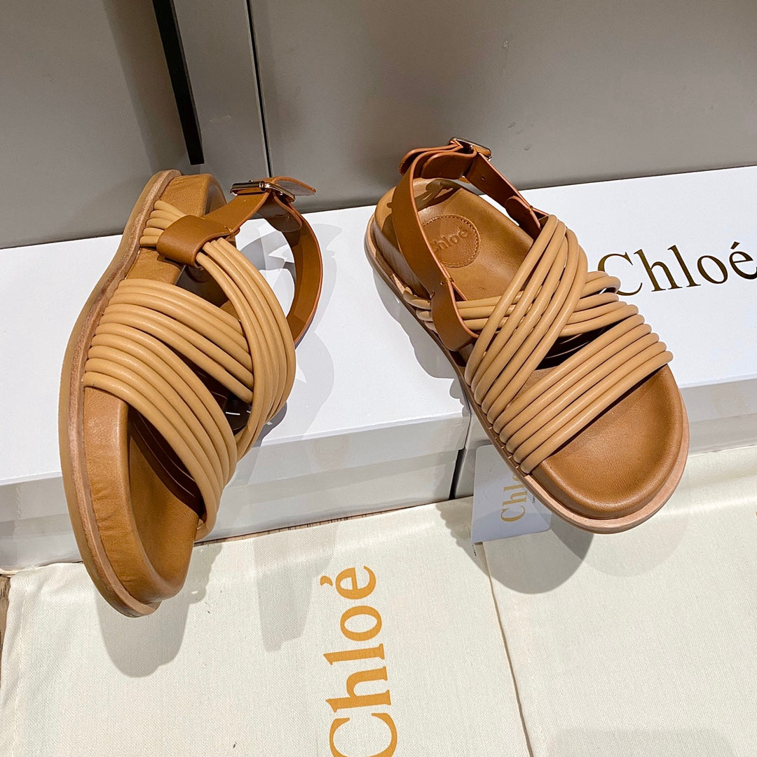 CHLOE CROSS STRAP SANDAL IN BRONZE BROWN RUBBER WITH GOLD HARDWARE