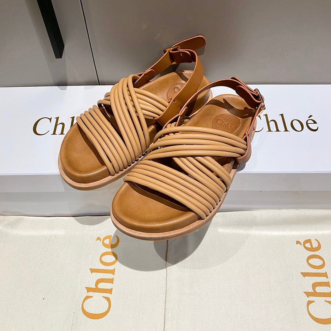 CHLOE CROSS STRAP SANDAL IN BRONZE BROWN RUBBER WITH GOLD HARDWARE