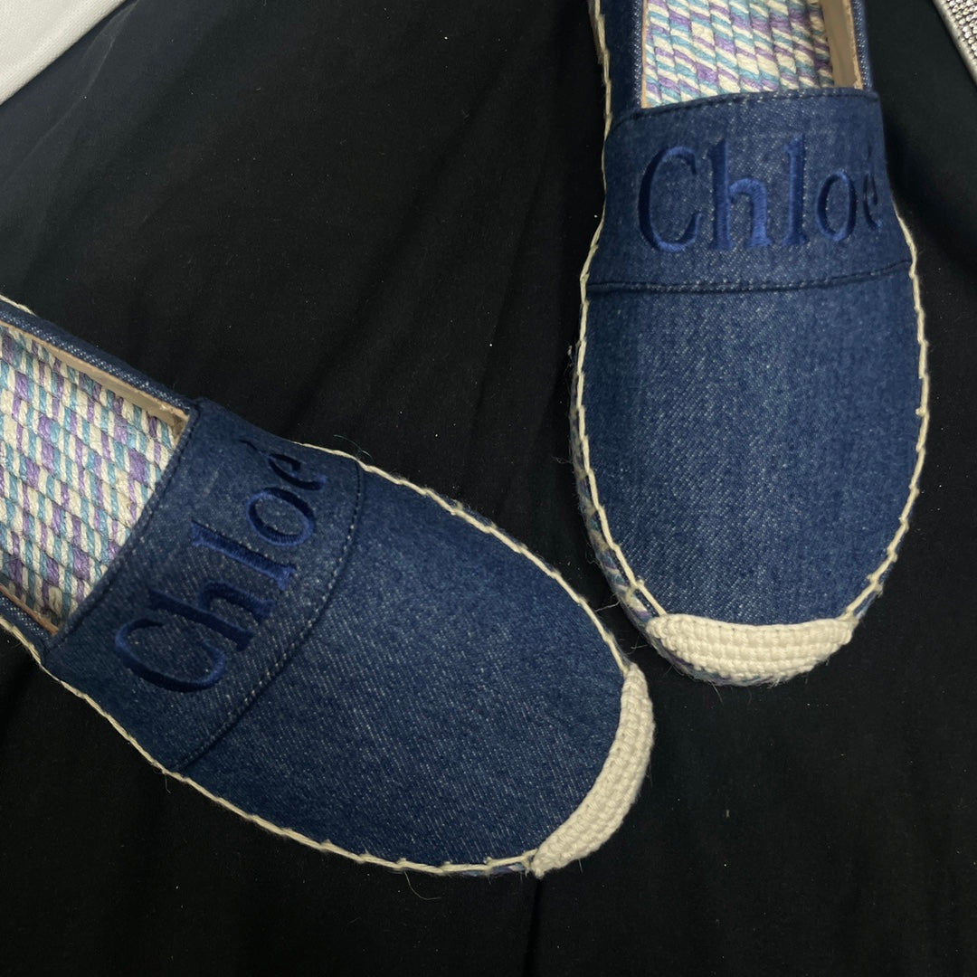 CHLOÃ‰ WOVEN LOAFER IN NAVY BLUE DENIM AND COLORFUL RAFFIA