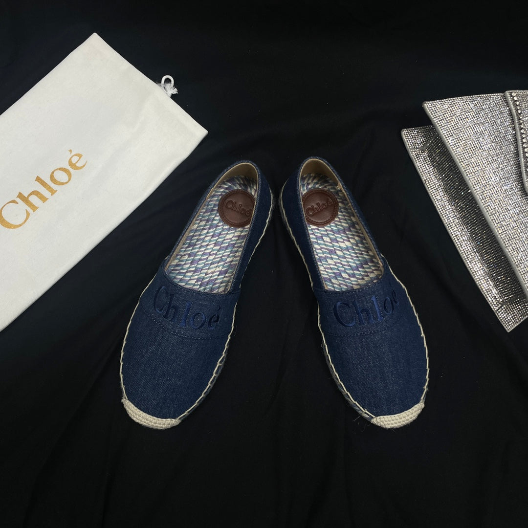 CHLOÃ‰ WOVEN LOAFER IN NAVY BLUE DENIM AND COLORFUL RAFFIA