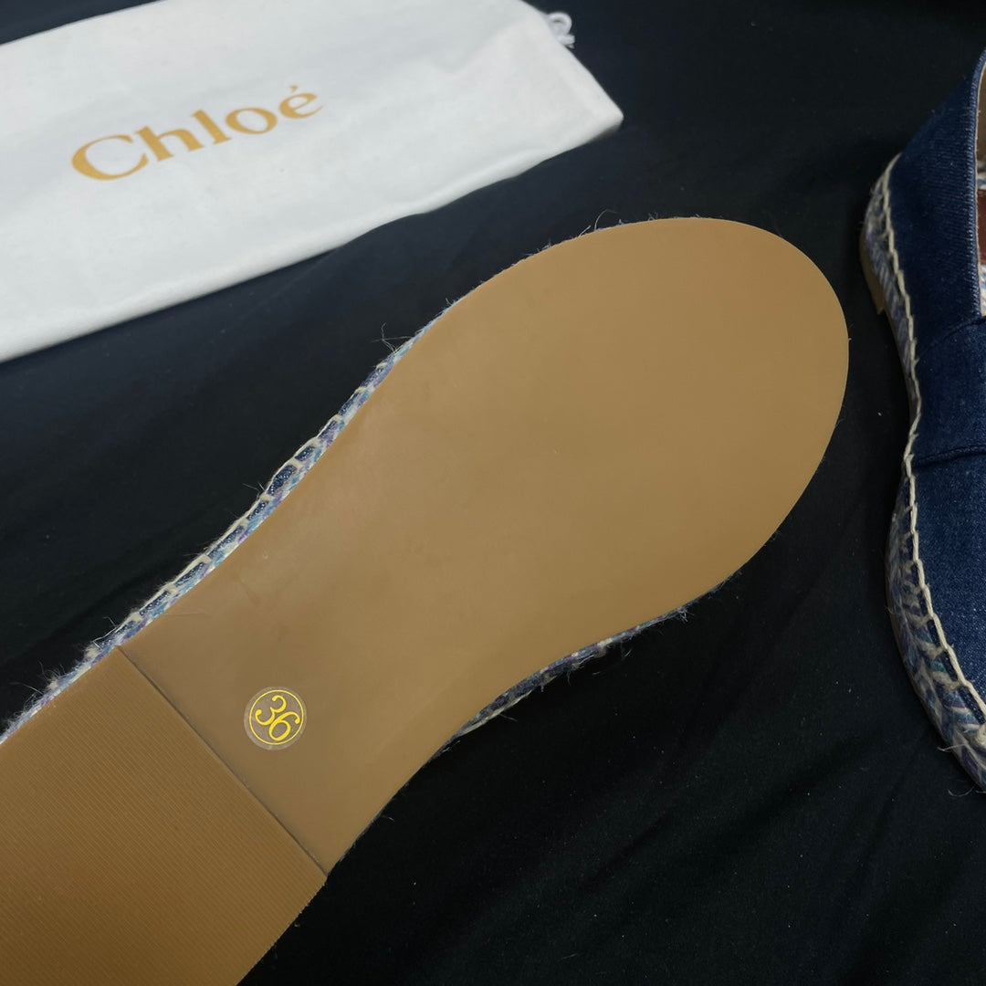 CHLOÃ‰ WOVEN LOAFER IN NAVY BLUE DENIM AND COLORFUL RAFFIA