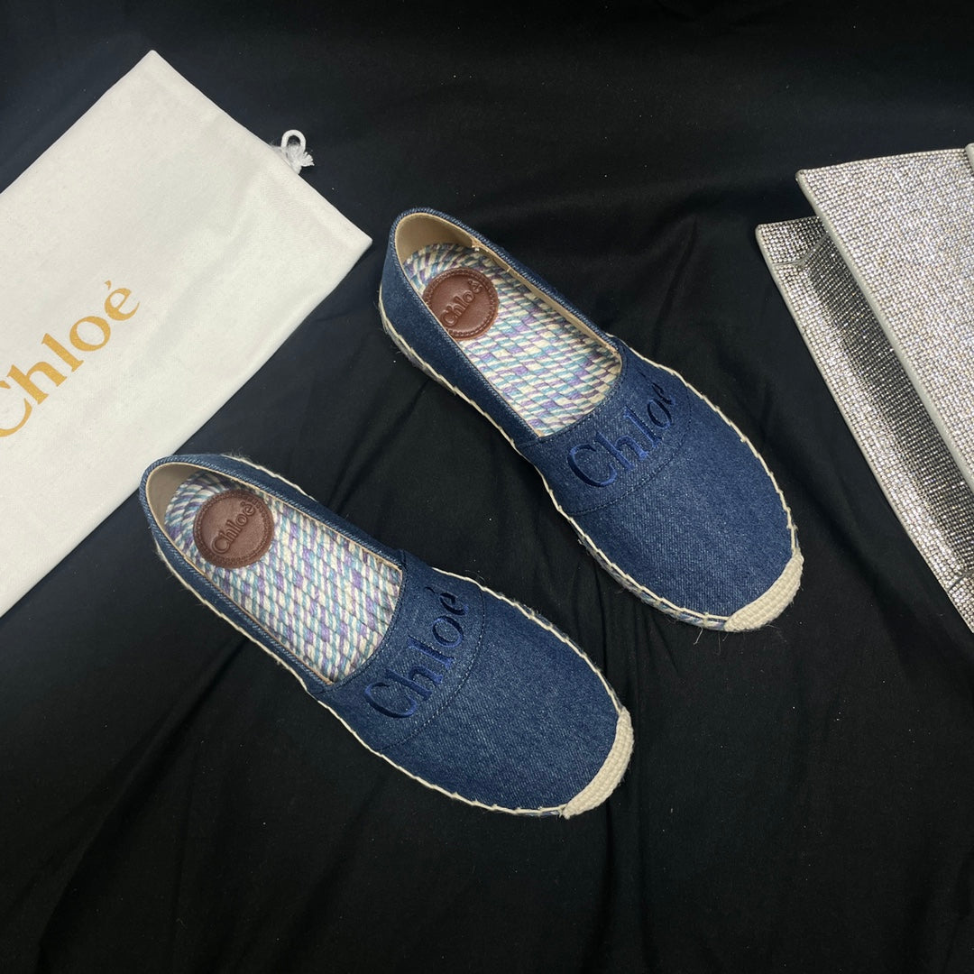 CHLOÃ‰ WOVEN LOAFER IN NAVY BLUE DENIM AND COLORFUL RAFFIA