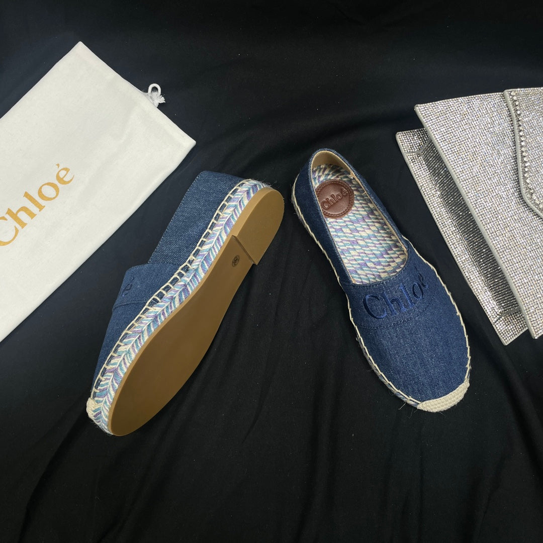 CHLOÃ‰ WOVEN LOAFER IN NAVY BLUE DENIM AND COLORFUL RAFFIA