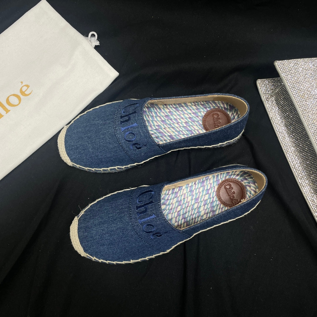 CHLOÃ‰ WOVEN LOAFER IN NAVY BLUE DENIM AND COLORFUL RAFFIA