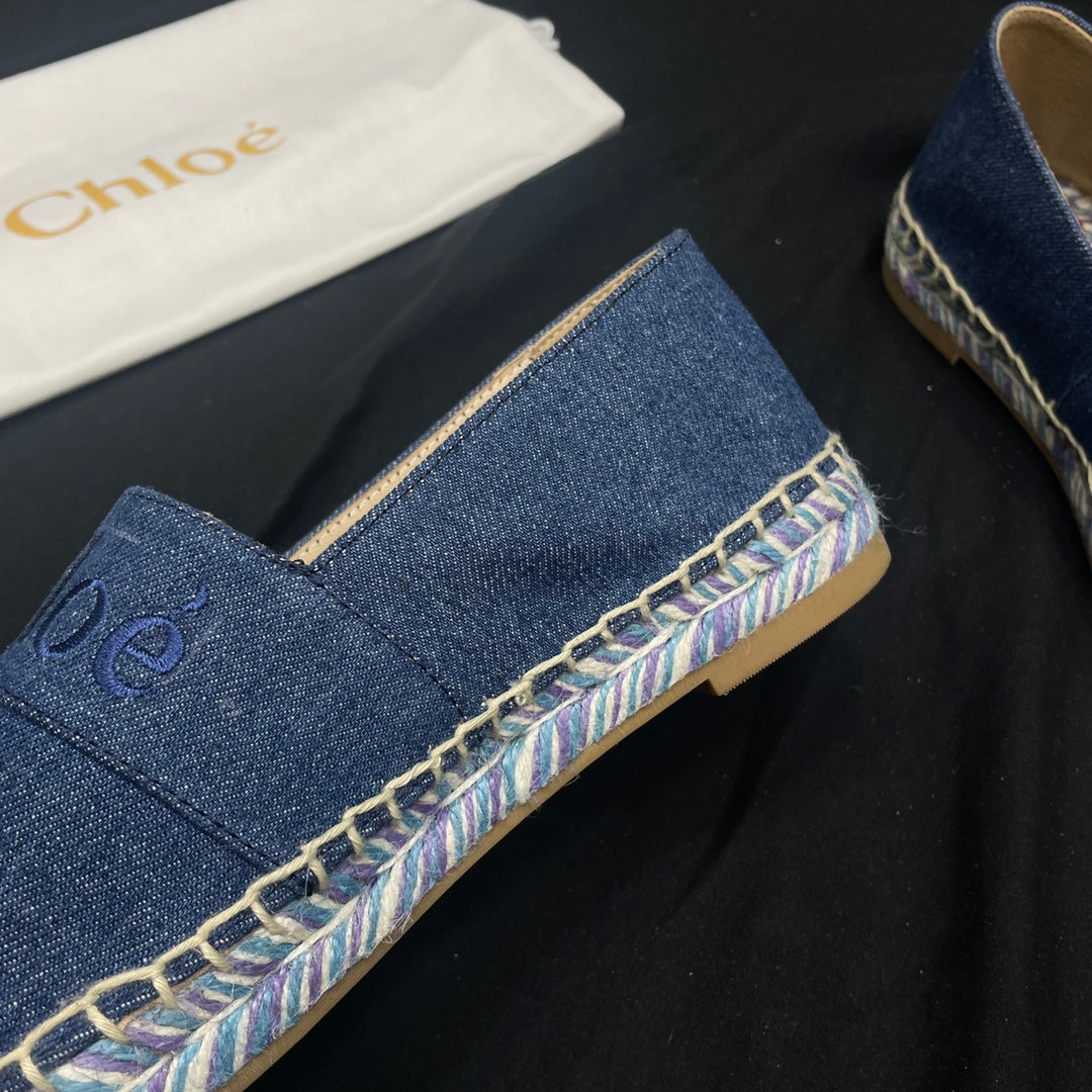 CHLOÃ‰ WOVEN LOAFER IN NAVY BLUE DENIM AND COLORFUL RAFFIA